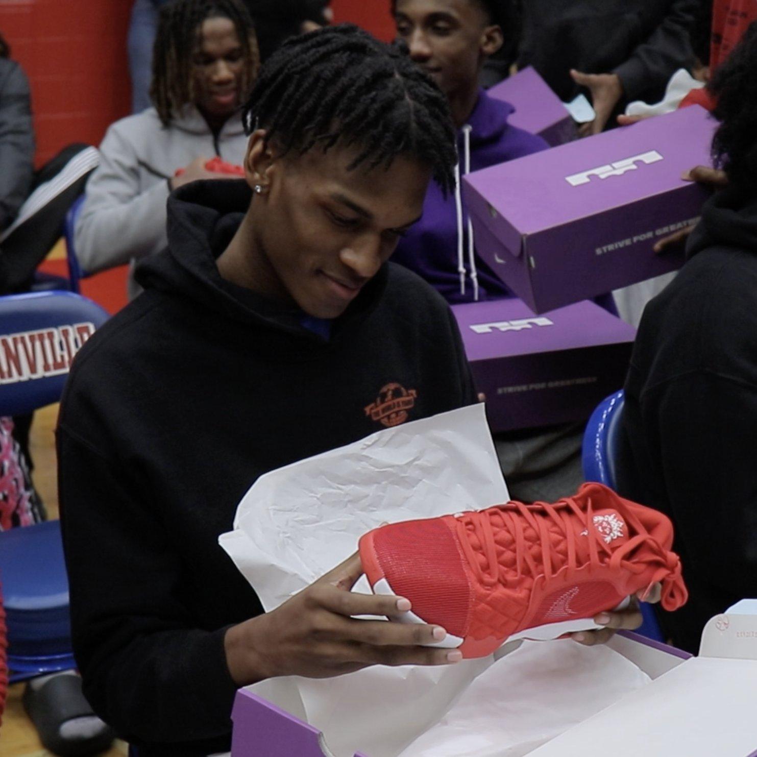 duncanville-basketball-player-admiring-new-lebron-shoes