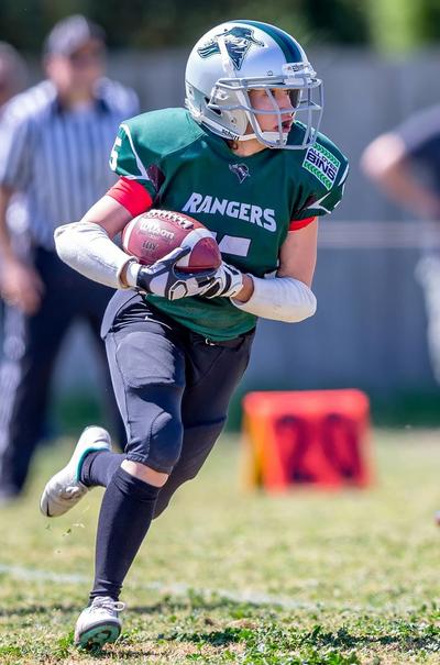 Required Youth Football Gear - Kid in Pads