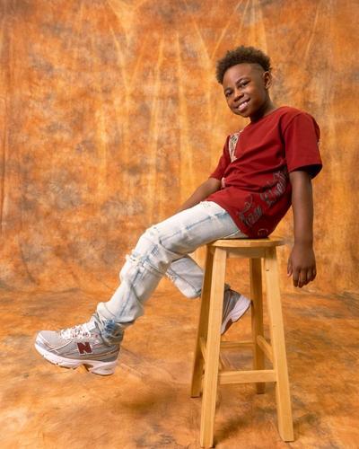 Boy modeling Graphic Tee