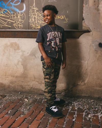 Boy modeling Jordan Tee