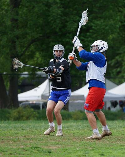 Men Playing Laacrosse