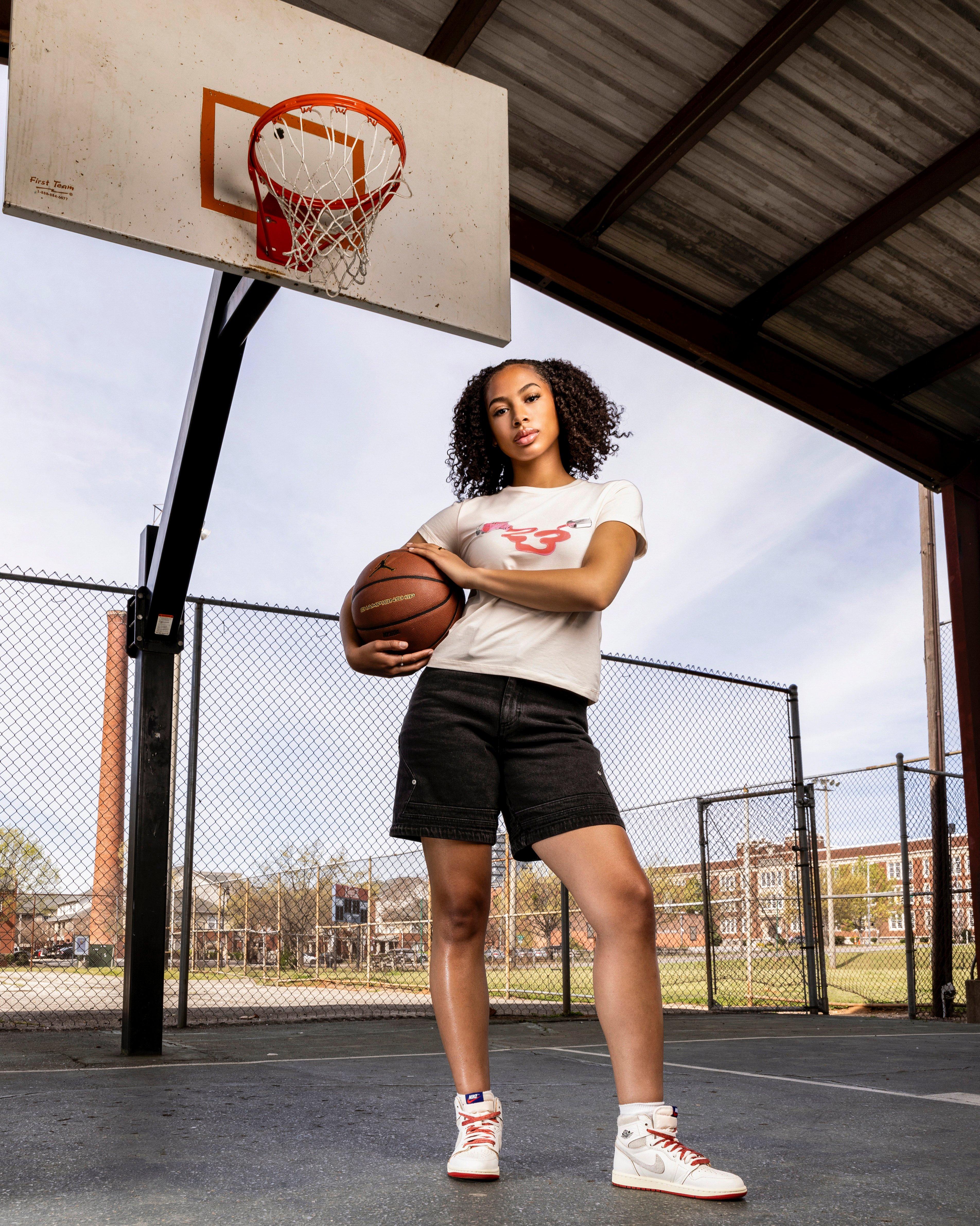 Jordan 1 High OG "Rare Air" woman standing in sneakers