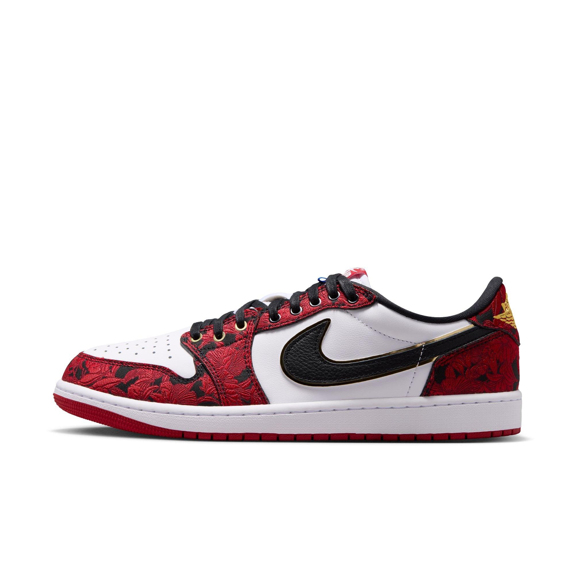 Side view of the Air Jordan 1 Retro Low OG Garden sneaker featuring white leather, red-and-black floral overlays, a black Swoosh with gold trim and a red outsole.