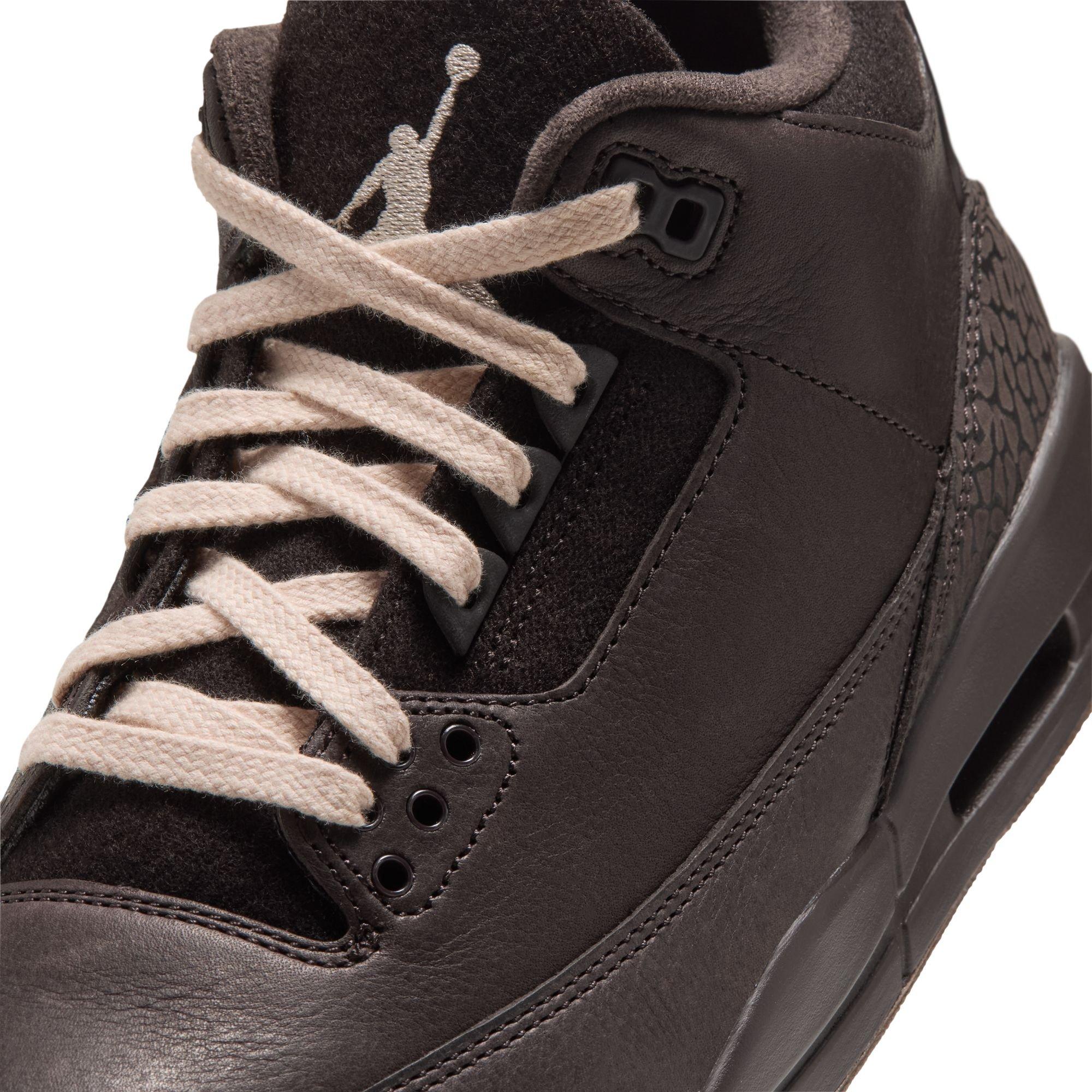 Close-up of a brown Air Jordan 3 Retro Fireside sneaker featuring beige laces, a suede tongue, leather overlays and tonal elephant print.