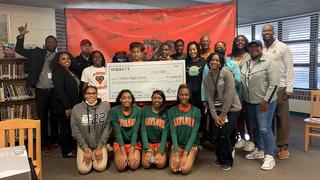 Leflore High School Women's Basketball Team with Support Her Sole Donation Check