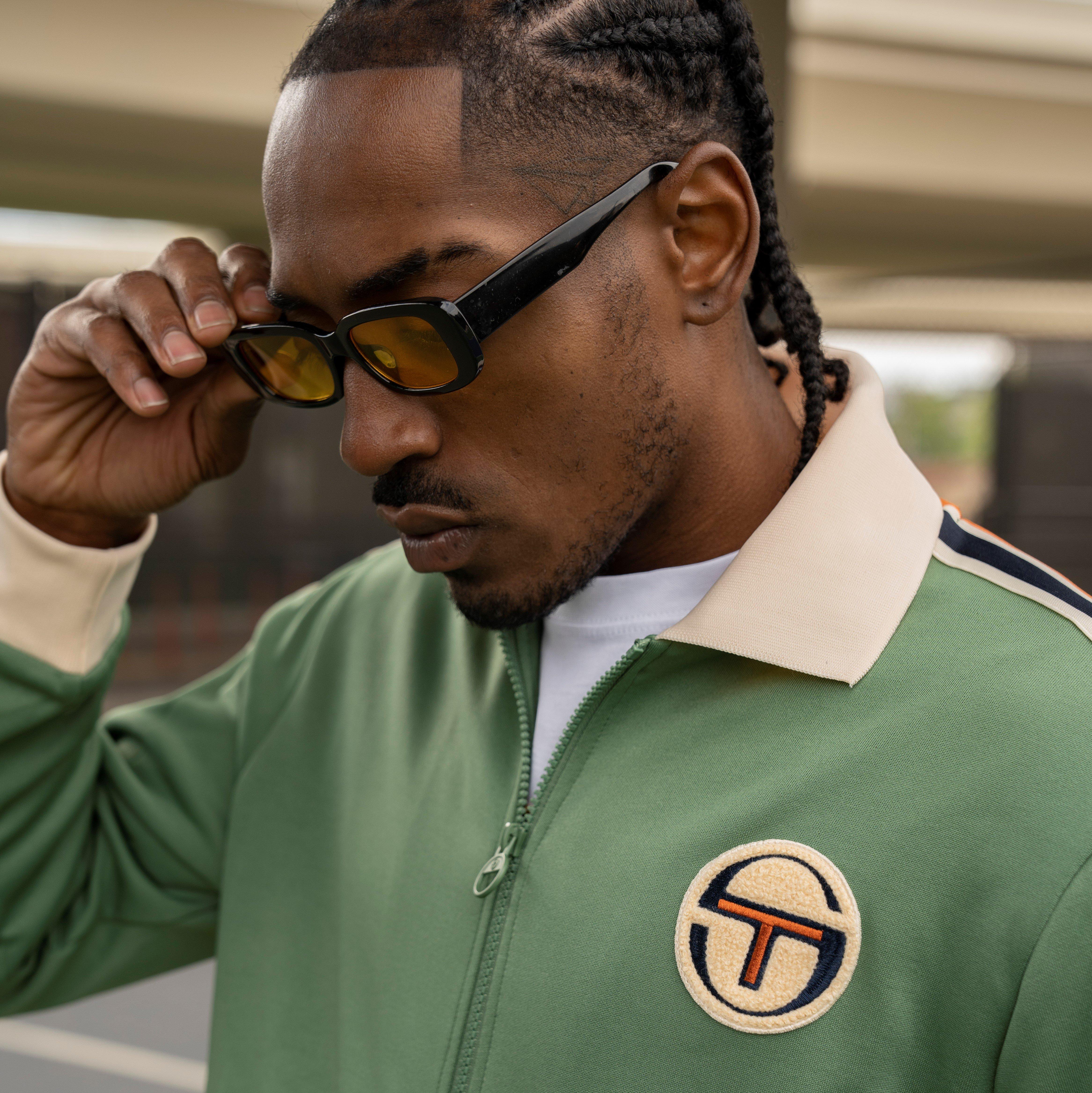 Maleake Kersh Modeling new brand track suit and shades