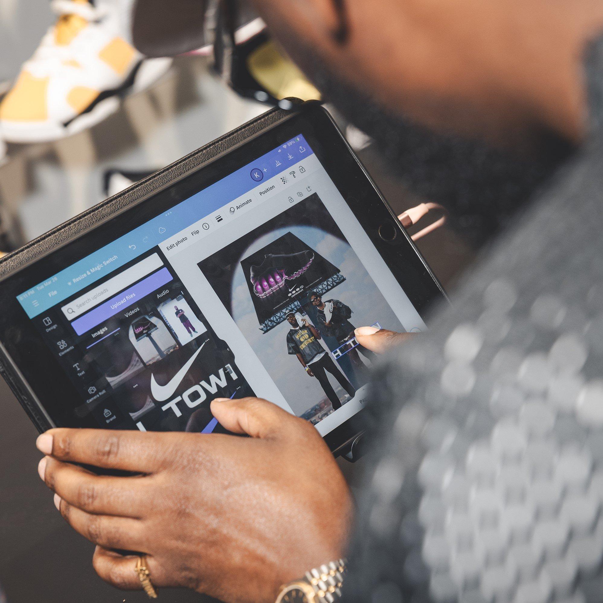 man-manipulating-tilted-reality-image-on-tablet