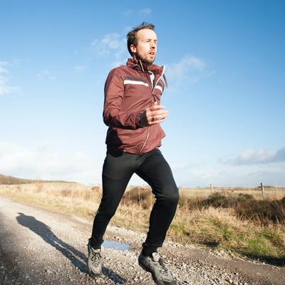 Terrain and Running Environment - Man Running on Trail