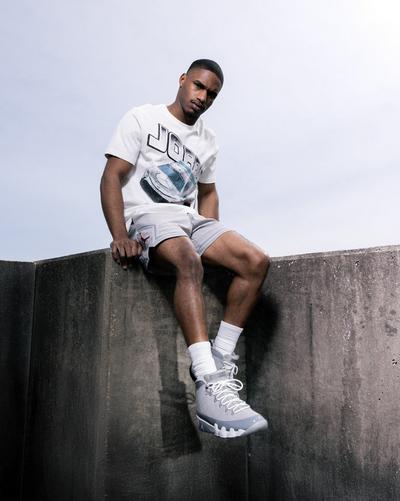 man-sitting-in-jordans-outside