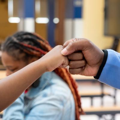 FOTB Cincinnati, OH - Mark Dorris fist-bumping student