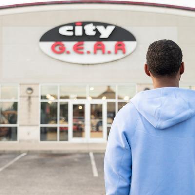 FOTB's Mark Dorris standing in front of City Gear storefront
