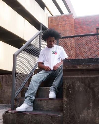 Man modeling graphic tee