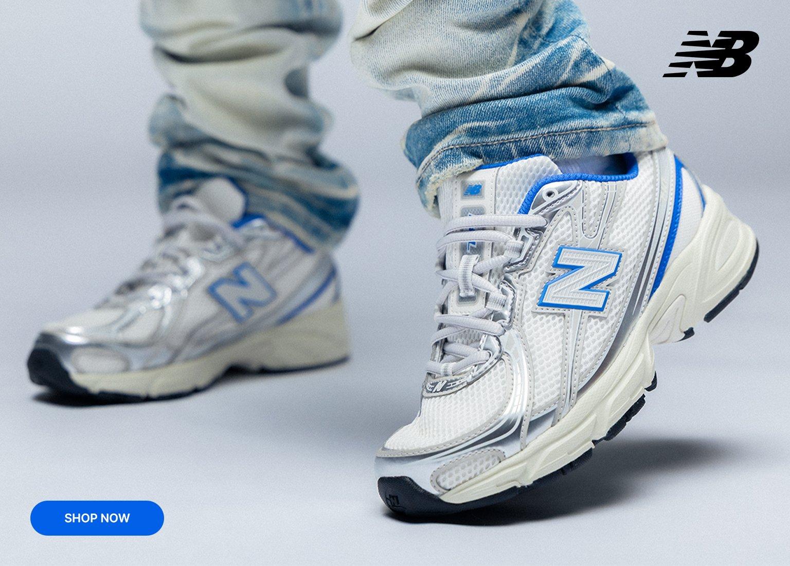 A young child and an adult wearing New Balance 740 sneakers in white, silver, and blue. The child is crouched on the left, while a close-up of the adult’s feet in the same shoes is shown on the right against a light blue gradient background. A Shop Now button and the New Balance logo are visible.
