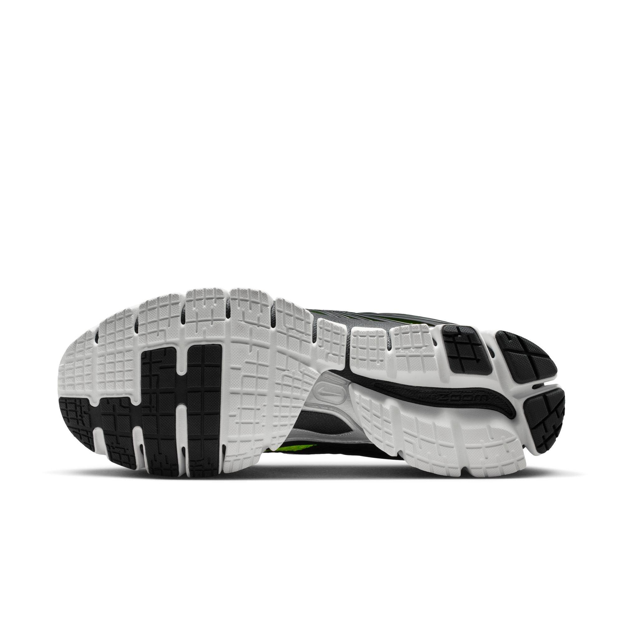 Bottom view of the Nike Zoom Skylon 11 Volt sneaker showing a white and black traction outsole with segmented tread.