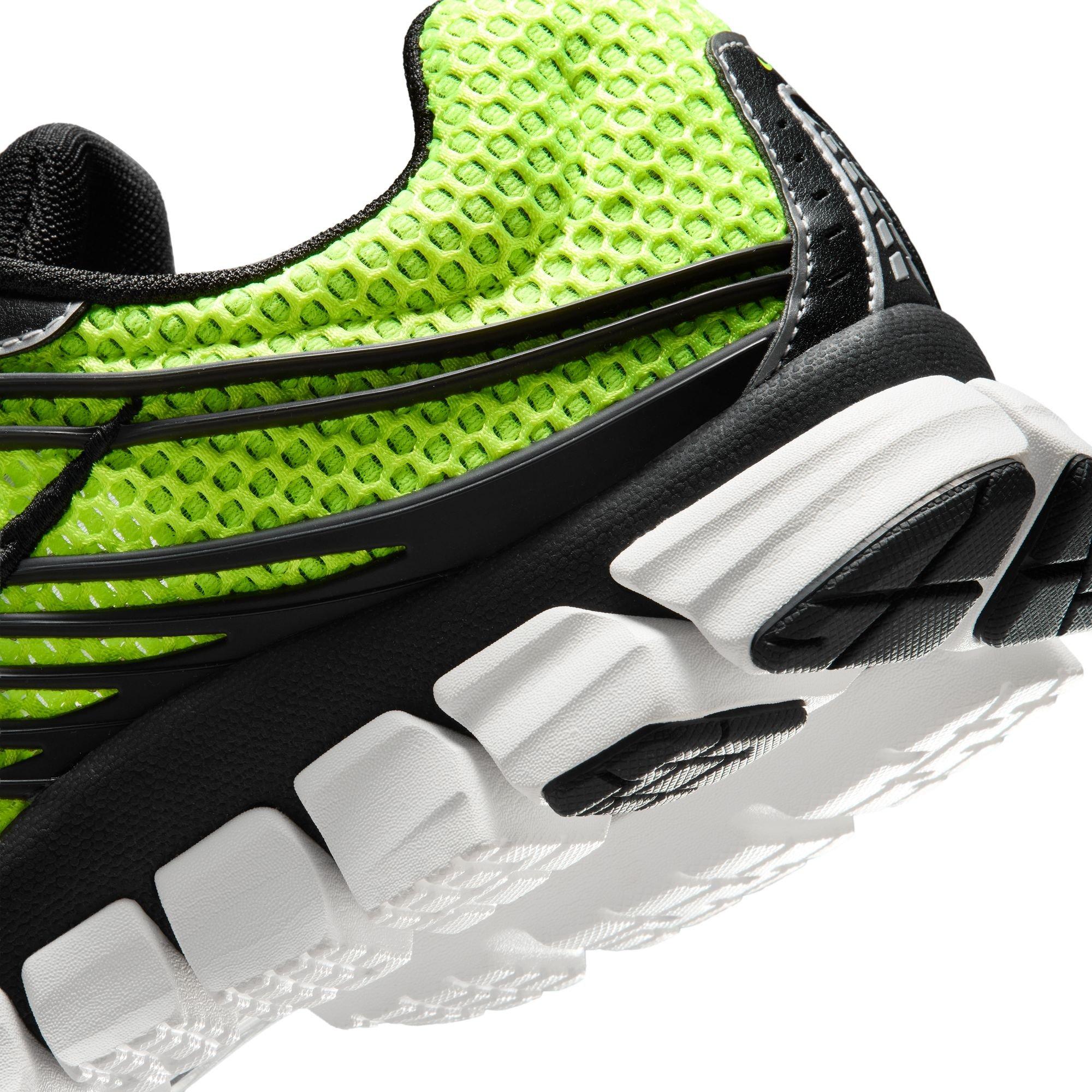 Close-up of the Nike Zoom Skylon 11 Volt sneaker heel featuring bright green mesh, black cage detailing and a white segmented midsole.