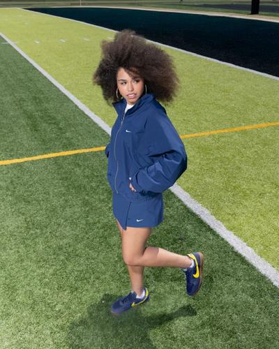 Women modeling Nike apparel