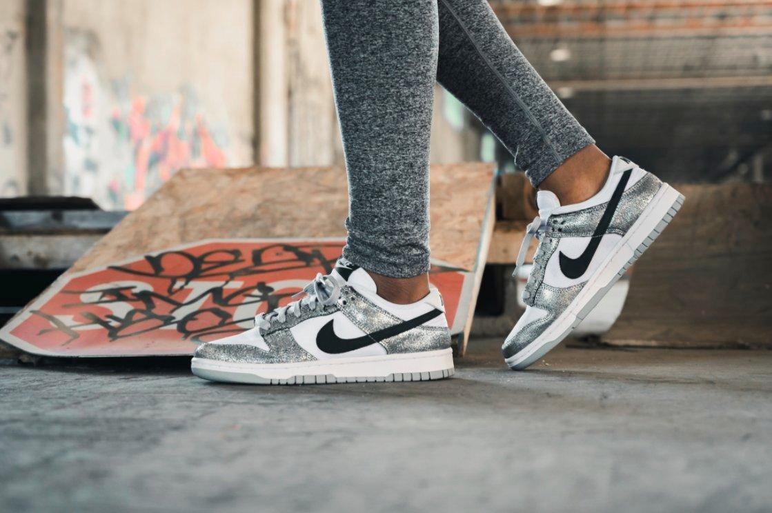 This Women's Nike Dunk High is TRENDING! Silver Glitter Swoosh