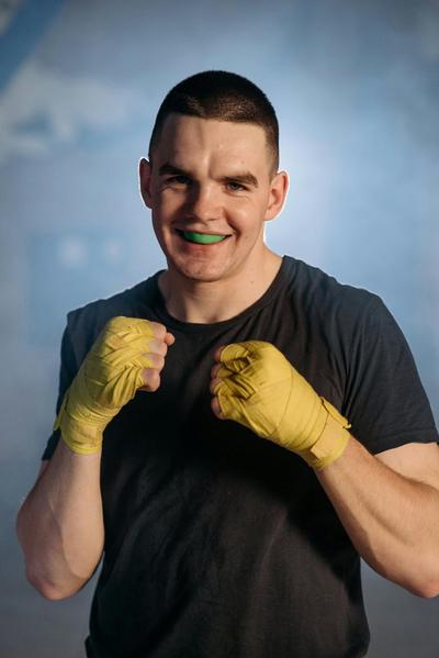 Man wearing wrestling mouthguard 