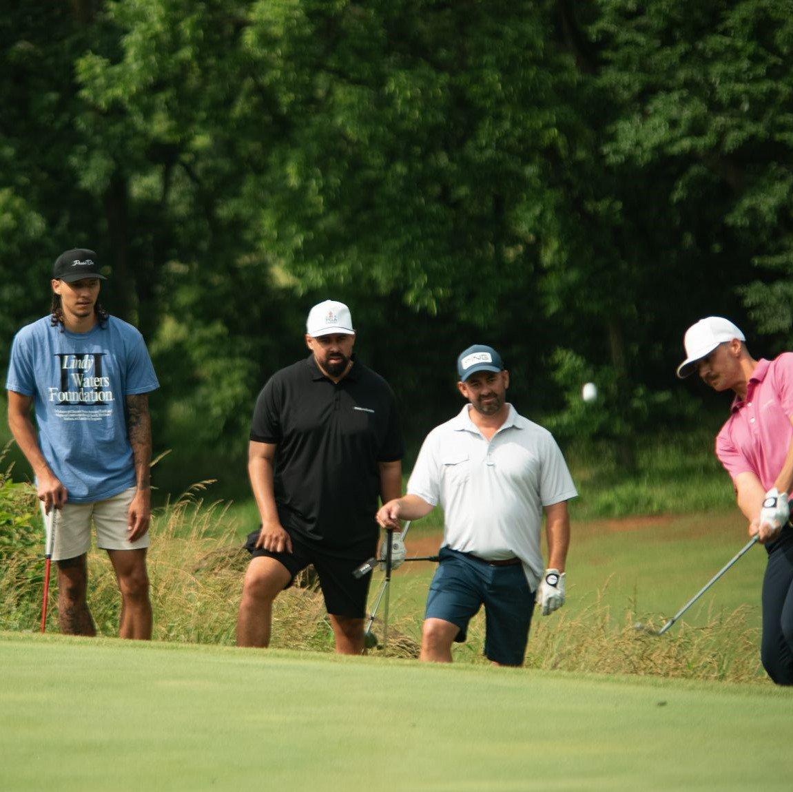 player-on-golf-green-mid-swing