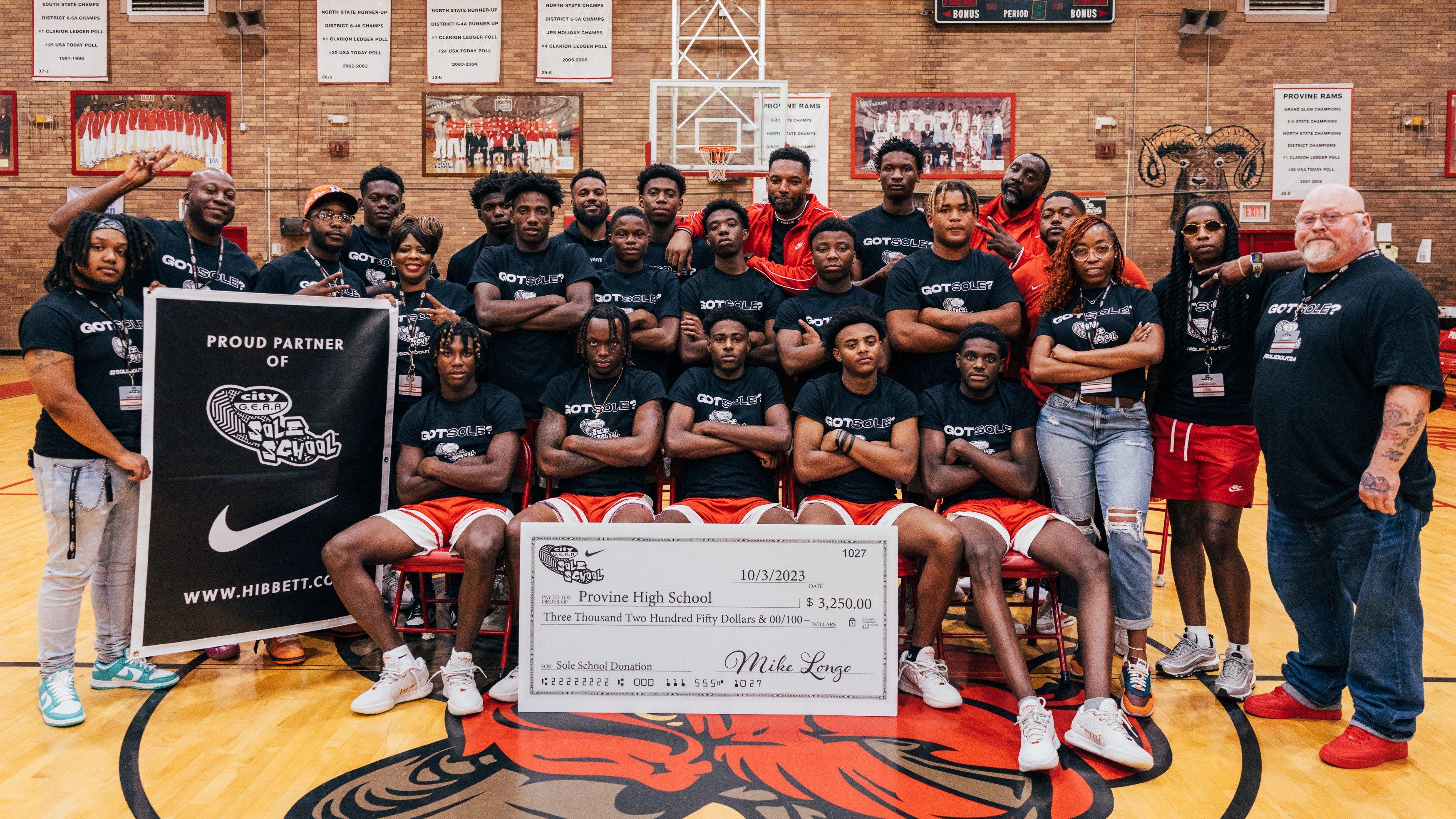 Provine High School Men's Basketball Team with Sole School donation check