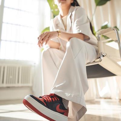 Roann Mesina sitting wearing Nike shoes