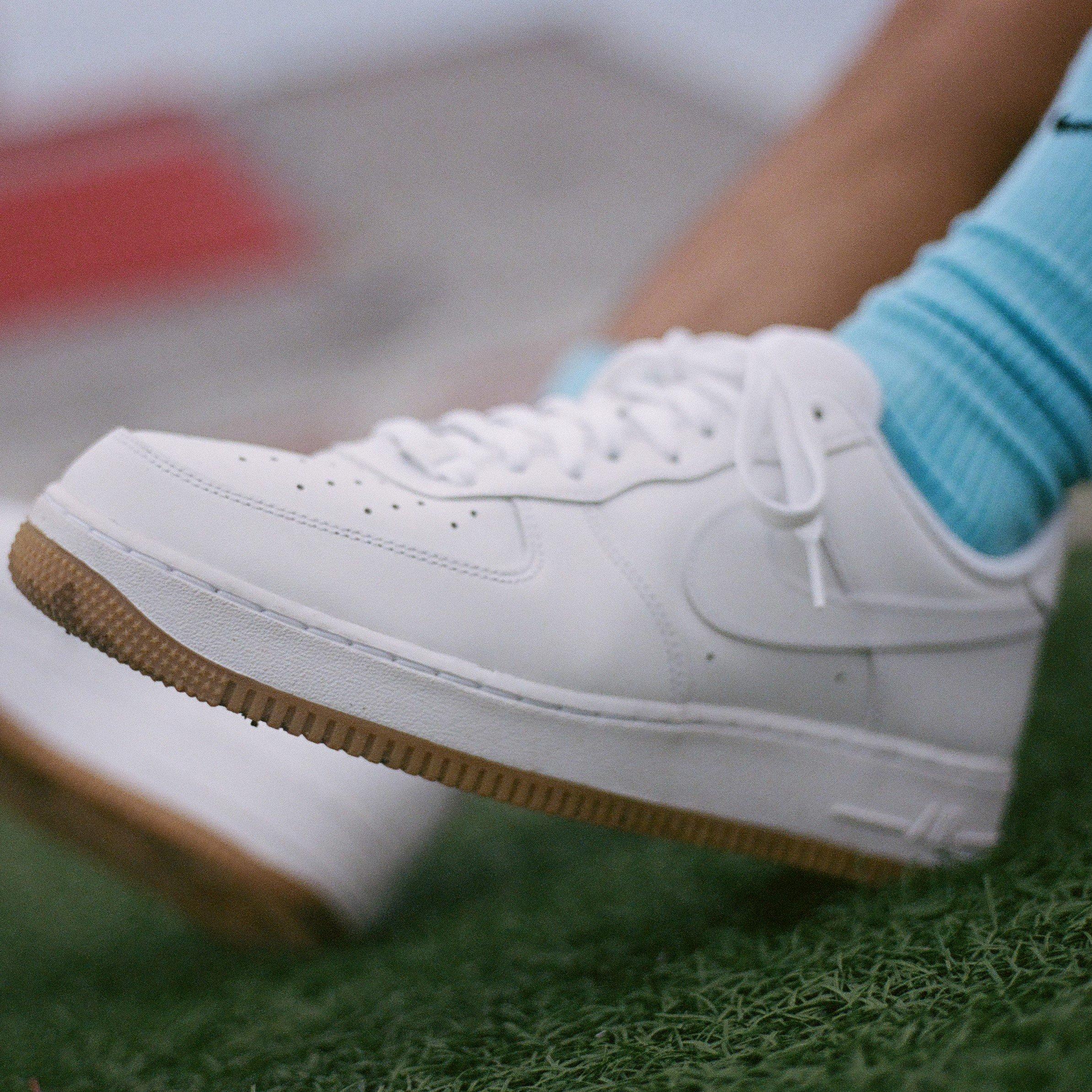 Close up image of Gabe Vargas' triple white AF1