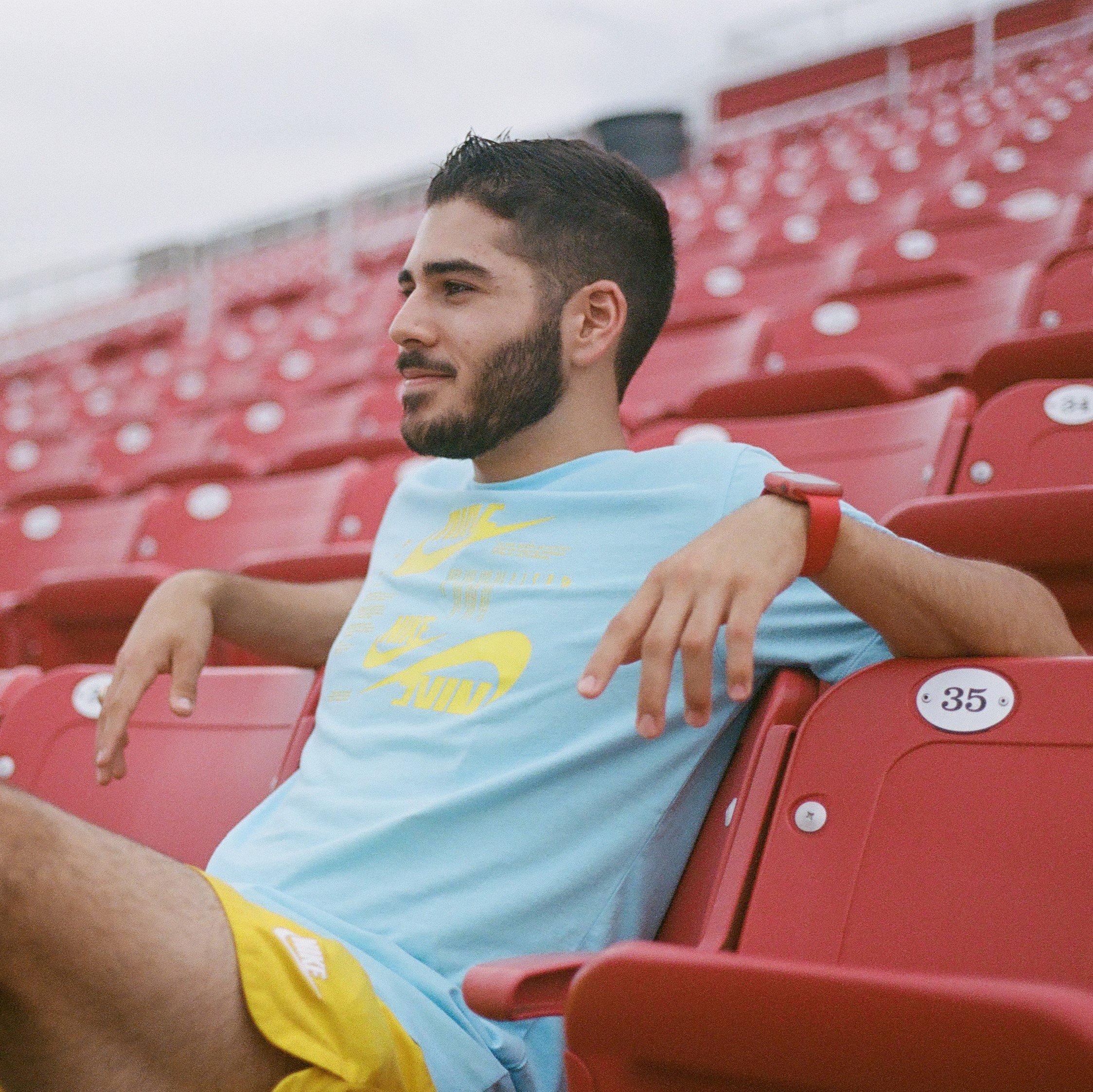 Gabe Vargas sitting in stadium seats
