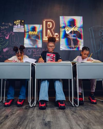 Students wearing dn8 at reading with a rapper hq