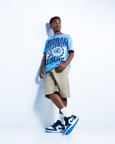 Boy modeling Air Jordan 1