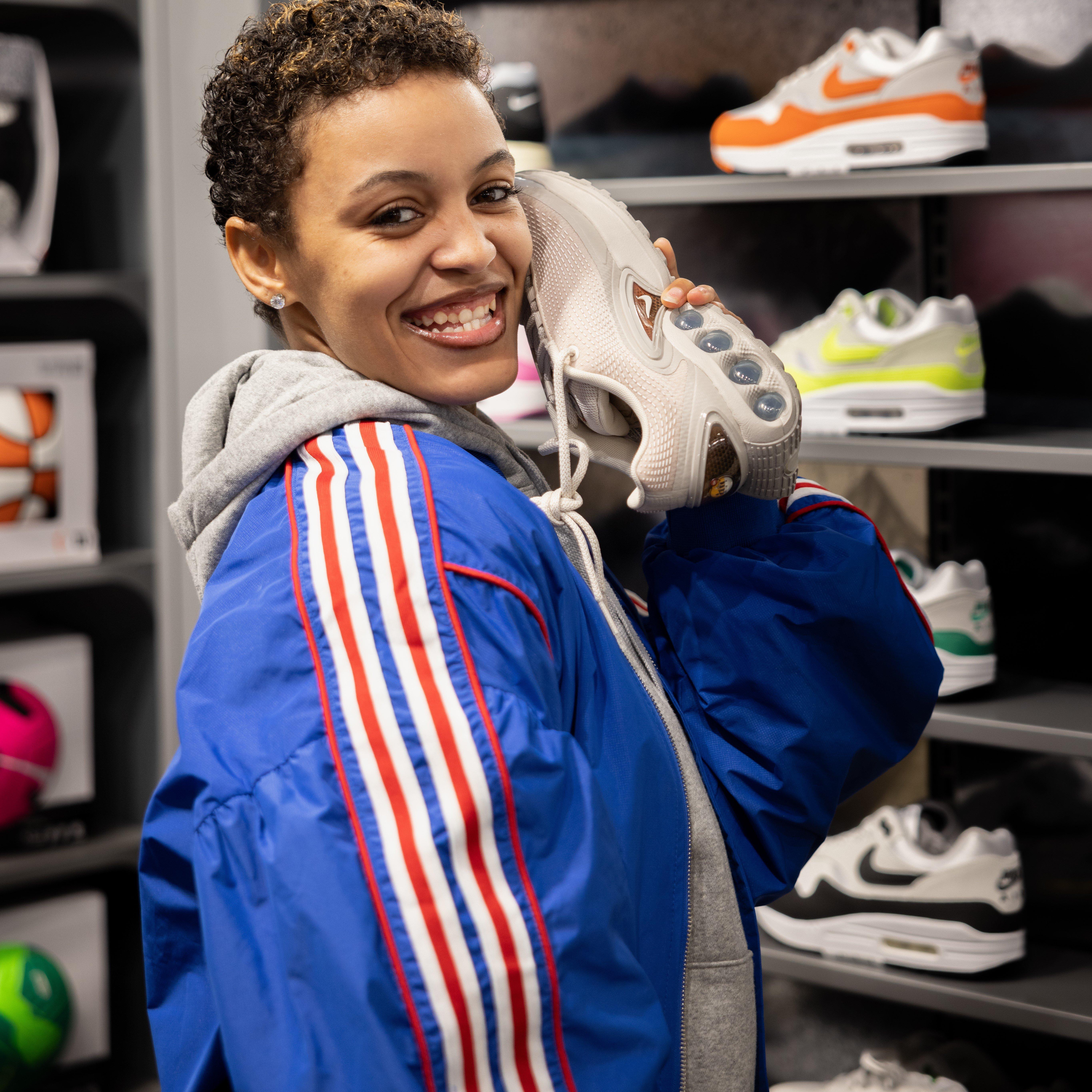 Supreme Sensai, gamer, posing with Nike Air Max Dn