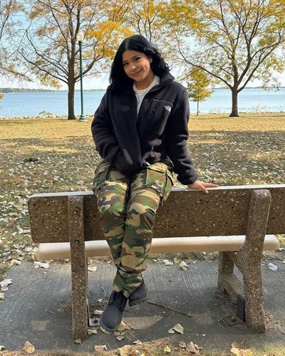 Women modeling Timberland Boots