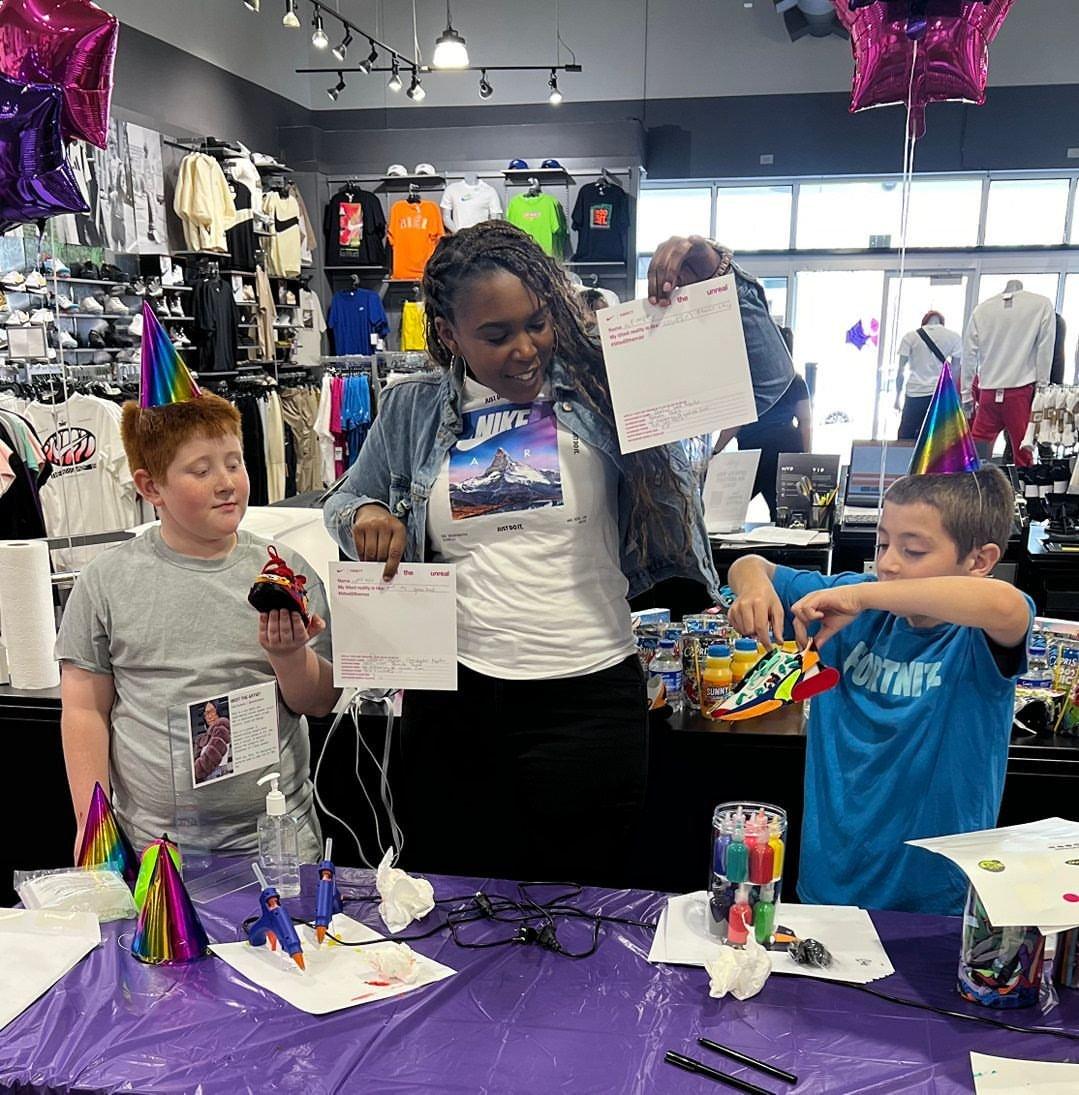 two-kids-getting-help-with-their-air-max-dn-craft