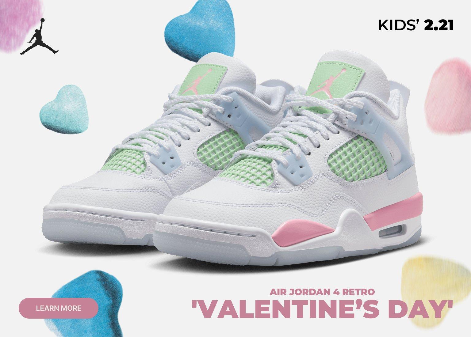 Promotional graphic for the Air Jordan 4 Retro 'Valentine's Day' in kids' sizing. The image features white leather sneakers with light green mesh and pink accents, surrounded by floating blue, pink, and yellow fuzzy hearts.