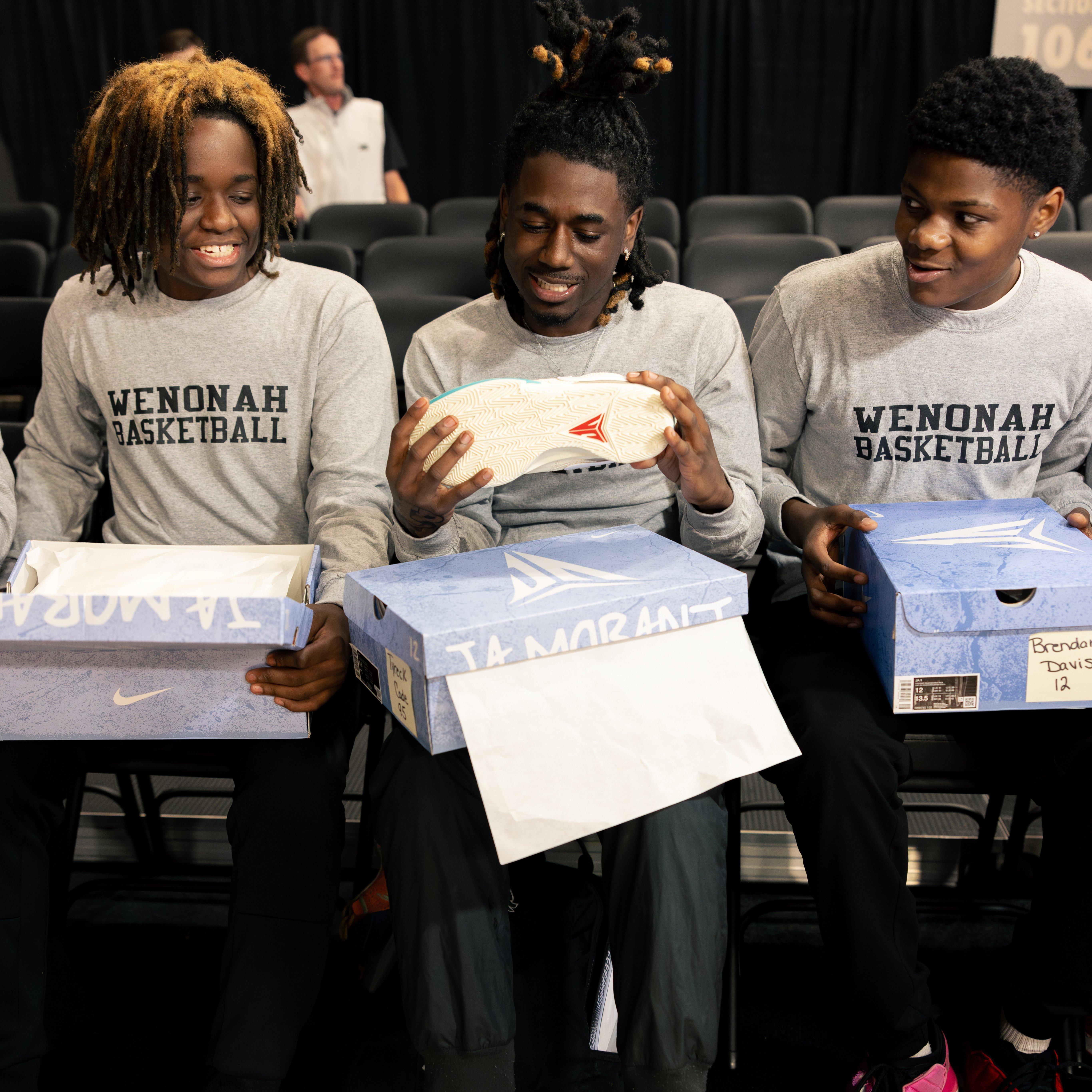 wenonah-hs-mens-basketball-players-opening-new-ja-basketball-shoes