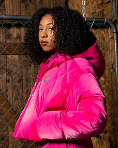 Woman modeling True Religion Women's High Shine Puffer Jacket