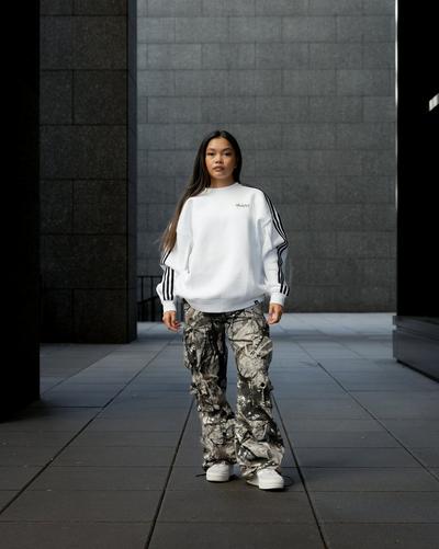 woman in adidas gazelle