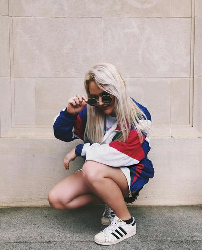 Woman in adidas Superstars