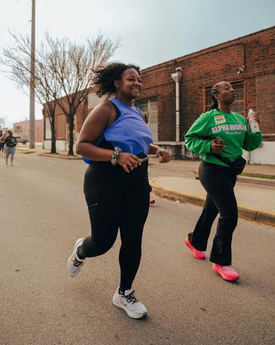 Two women running