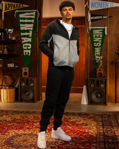 Young man in Nike Tech Fleece and Nike Air Force 1