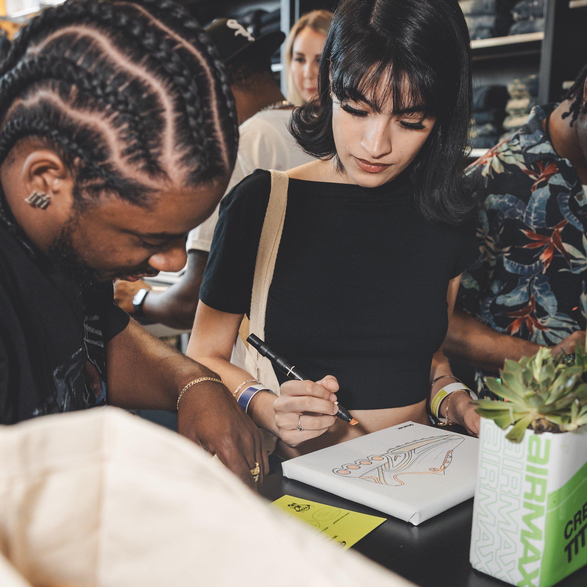 young-woman-coloring-in-her-air-max-dn-canvas