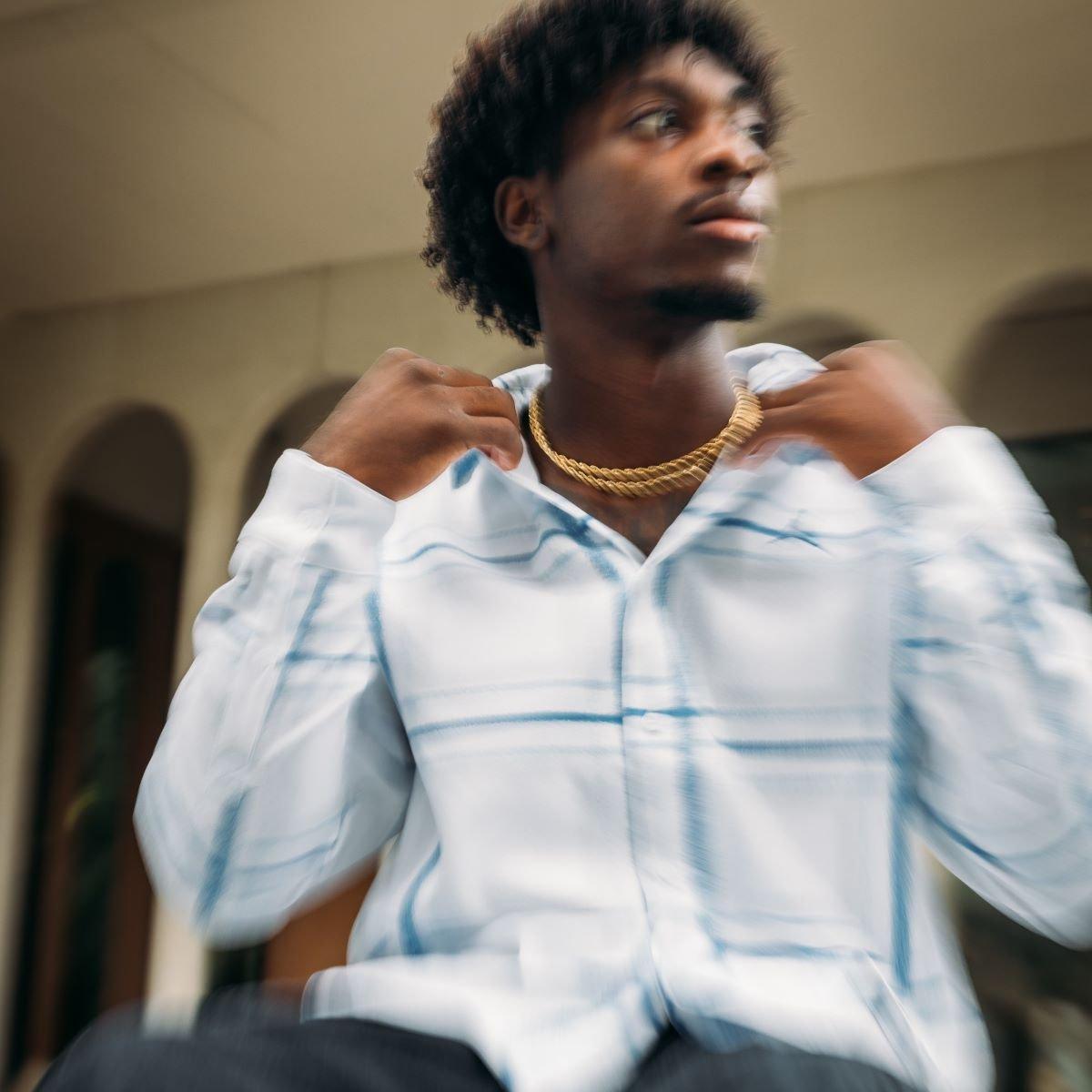 zach-branch-wearing-like-plaid-collared-shirt