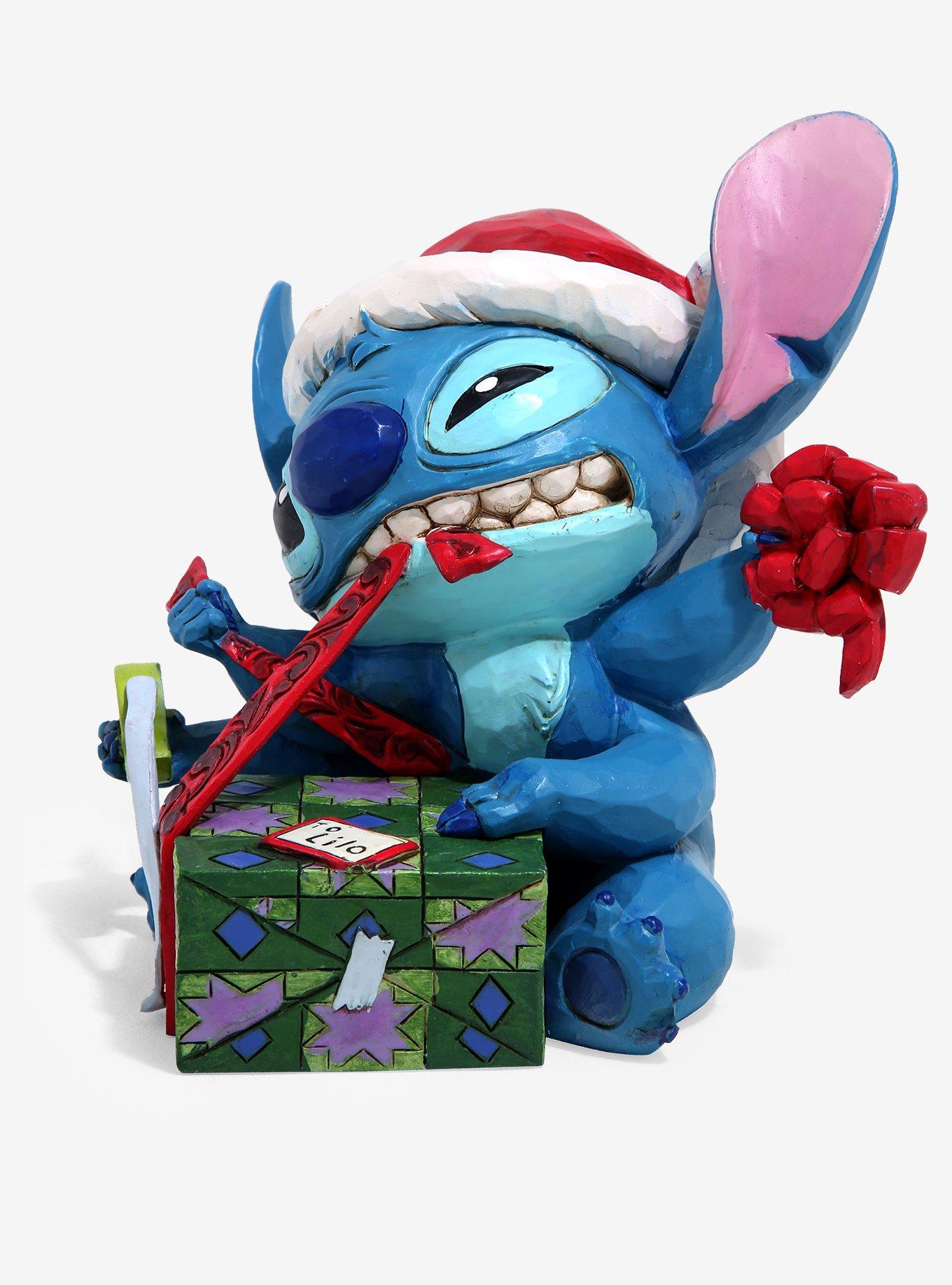 Santa Stitch Wrapping Present Figurine
