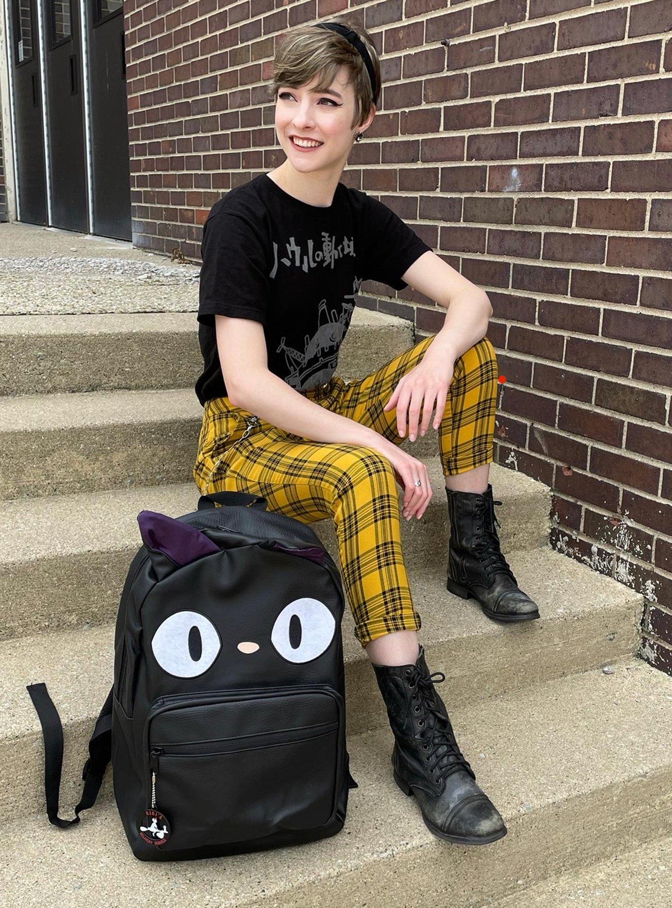 Hot Topic - What to pair with yellow plaid pants you ask? Here's an idea.  💛🖤 Pants:  Anime merch:   Accessories:  Shoes