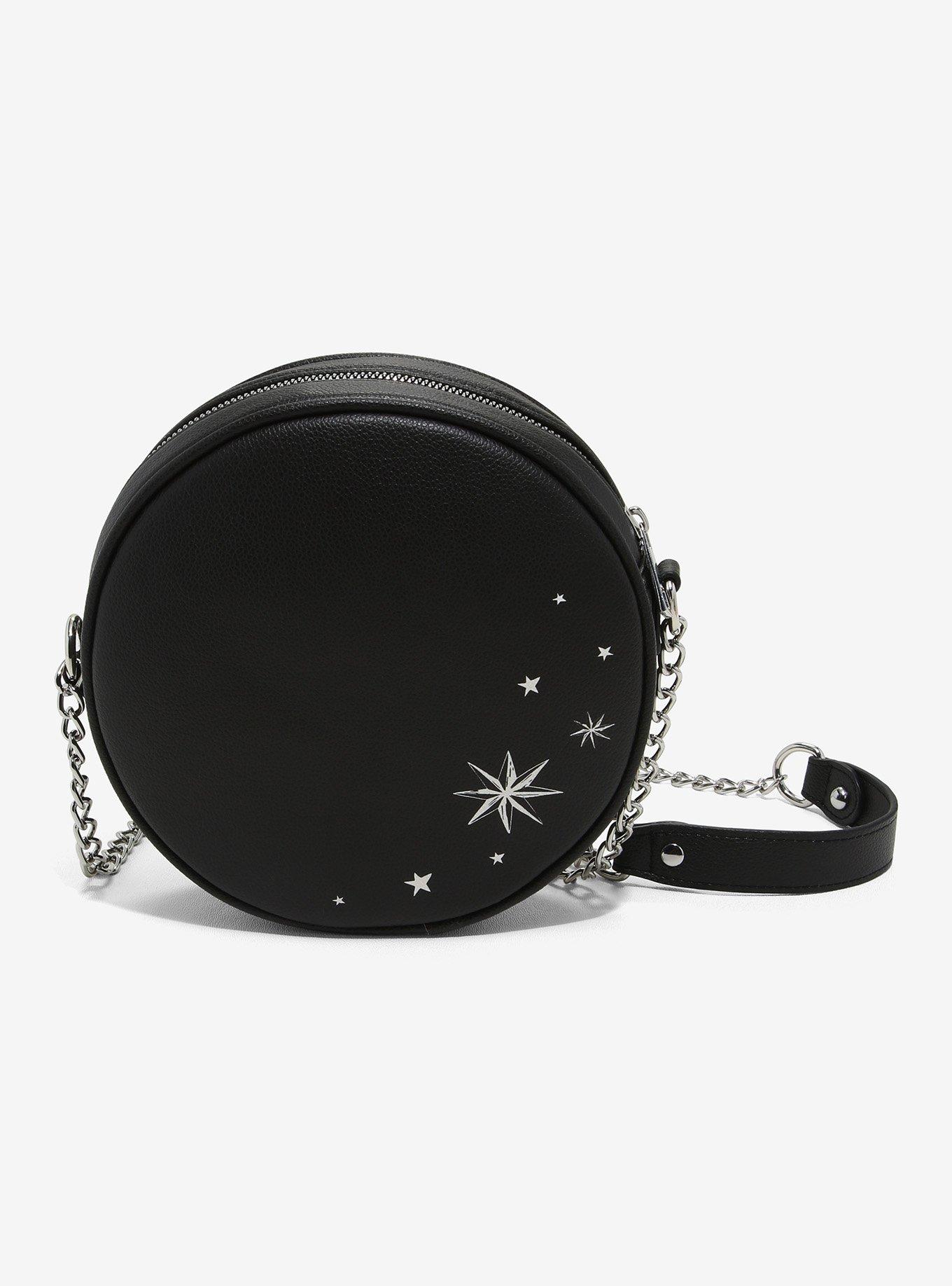 Glow in the Dark Bags (Parker House)  Glow in the Dark - These crossbody  bags has all the makings of an edgy arm candy. The Grey finished with an  iridescent sheen