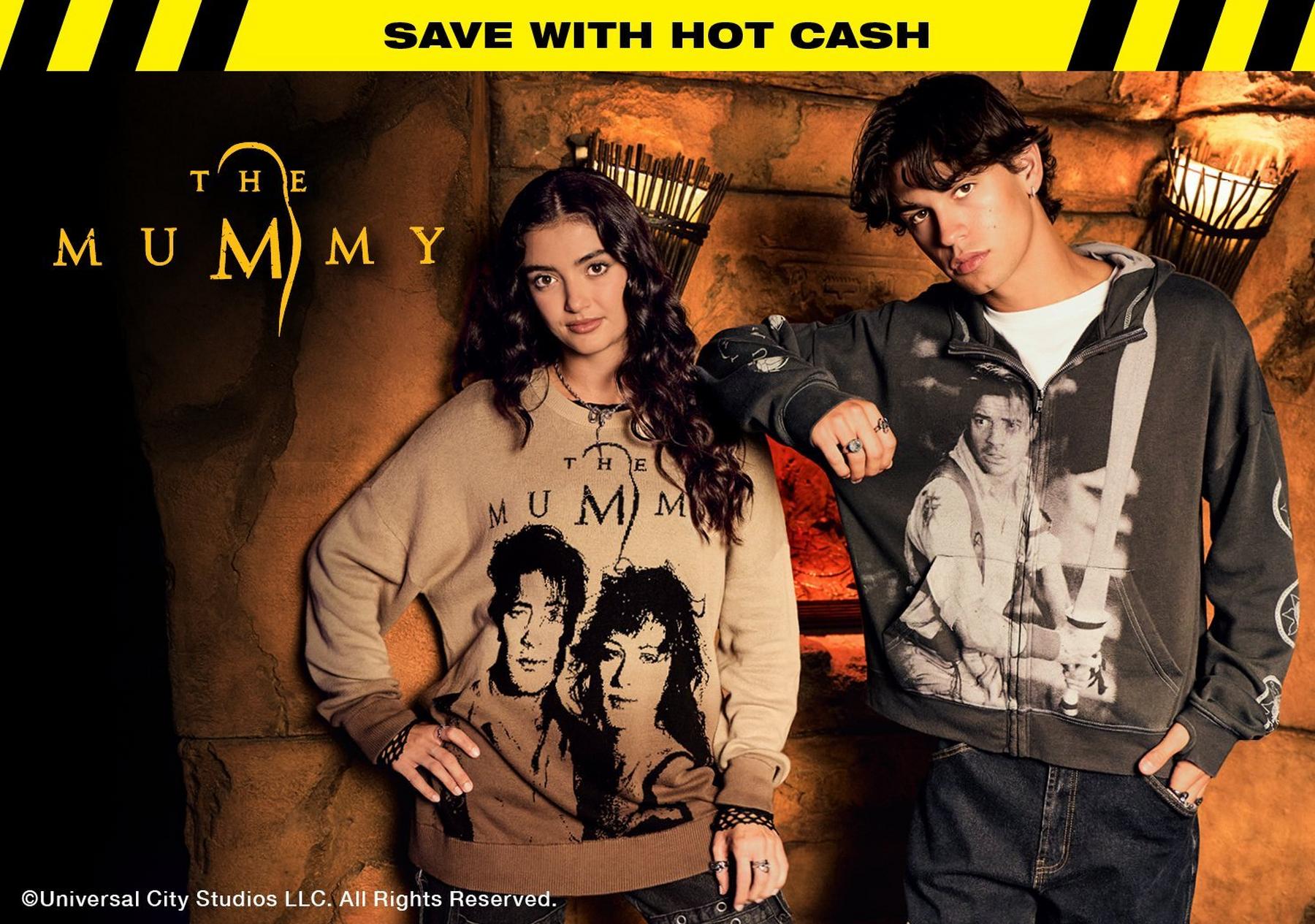 Two models wearing The Mummy graphic sweatshirt and hoodie with “SAVE WITH HOT CASH” text.