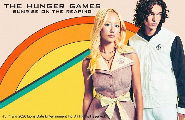 The Hunger Games: Sunrise on the Reaping poster with two characters standing in front of a rainbow. Shop Now.
