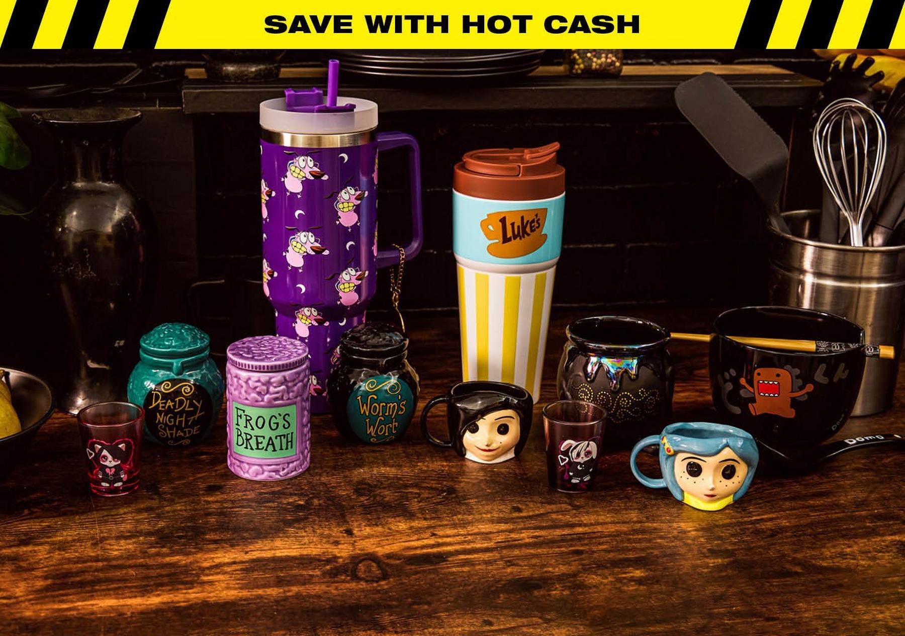 Assorted novelty mugs, shot glasses, and jars, including a purple tumbler and a “Luke’s” travel mug. Shop Now.