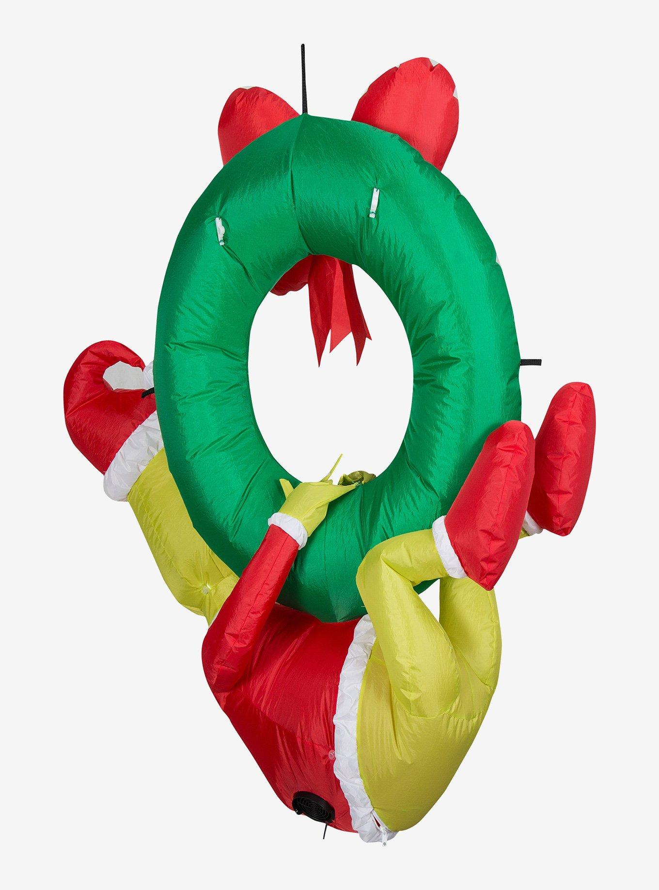 The Grinch Hanging from Wreath Airblown