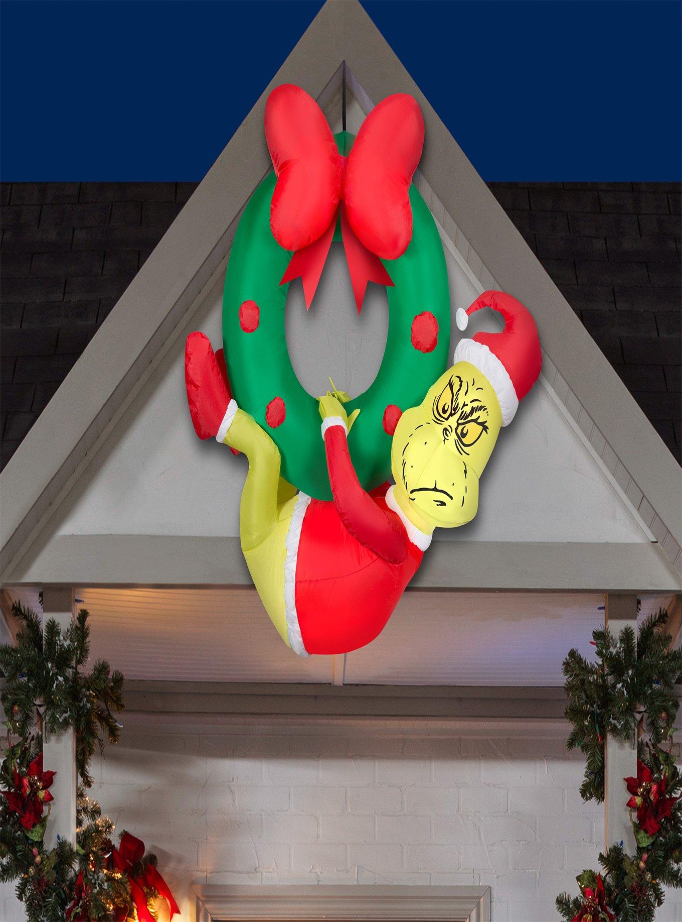 The Grinch Hanging from Wreath Airblown