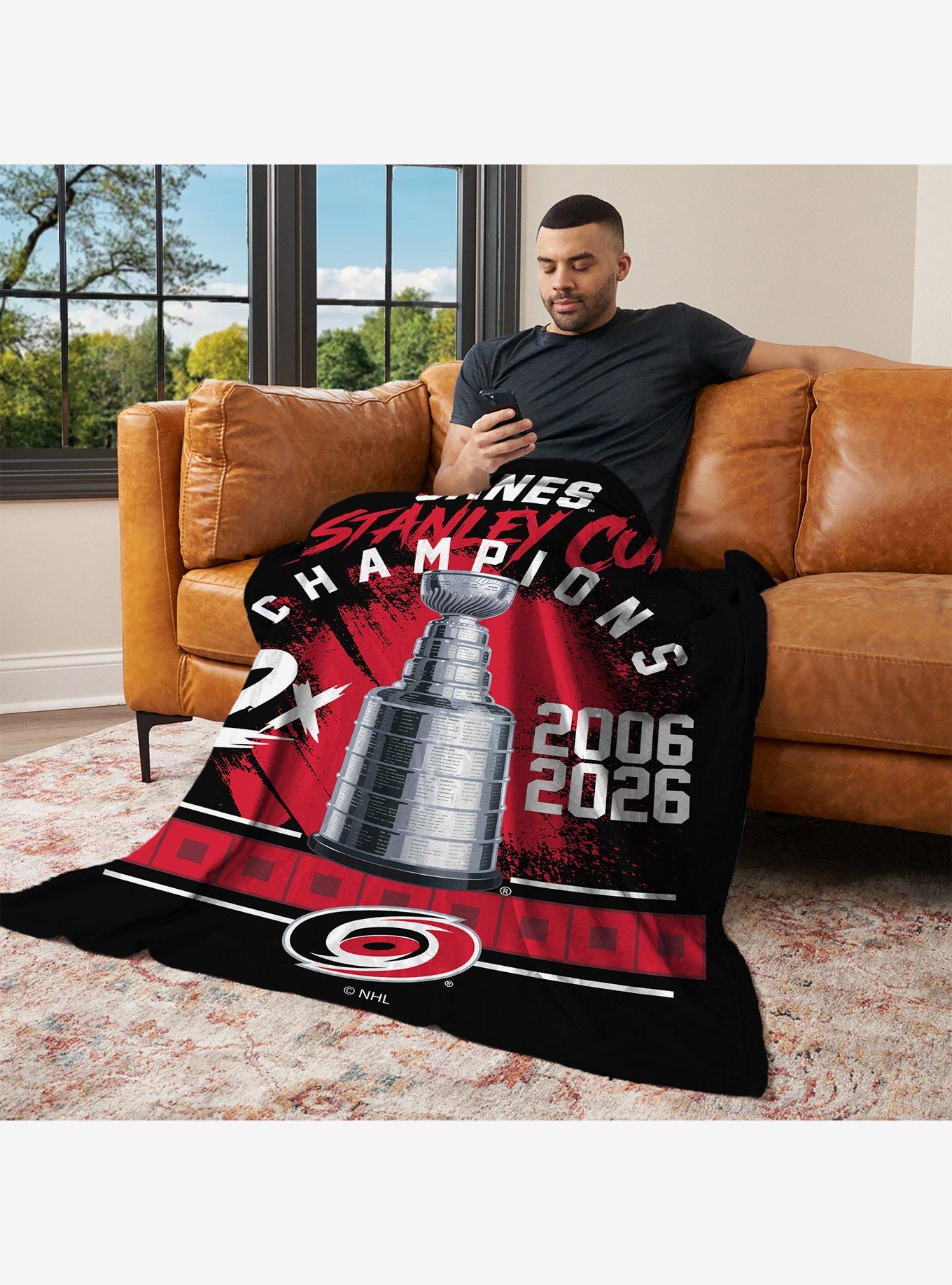 NHL Carolina Hurricanes Stanley Cup Multi-Champ Trophy Case Silk Touch Throw Blanket, , alternate - view 3